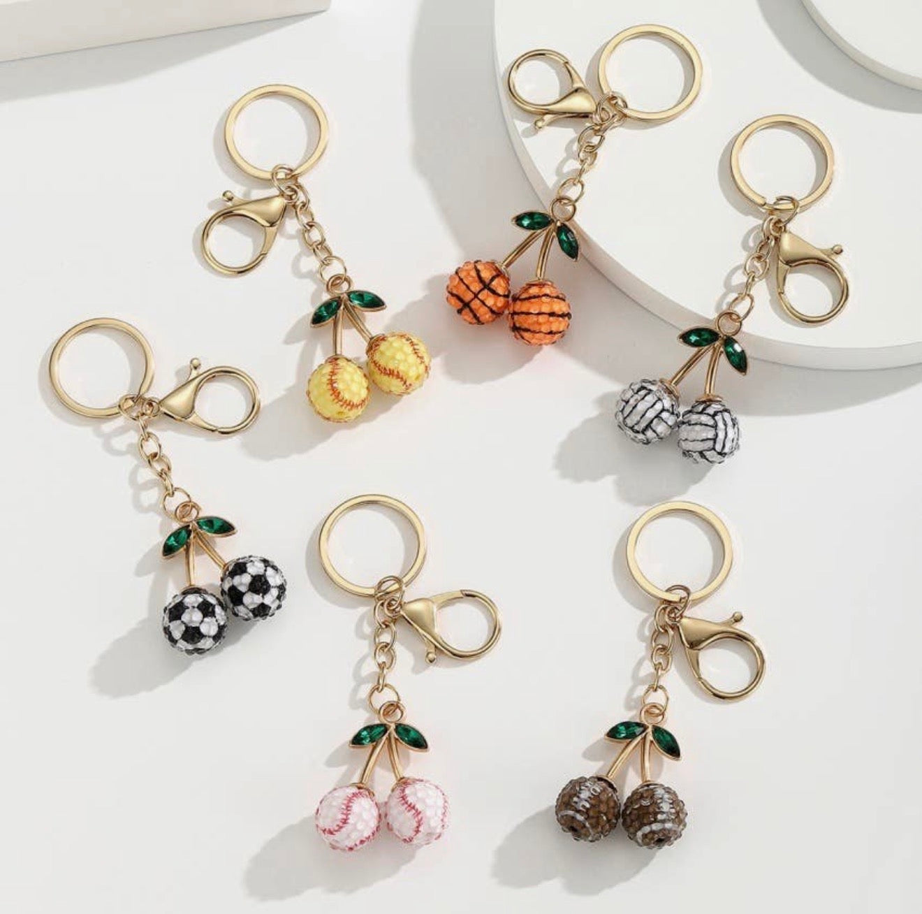Diamond-Encrusted Cherry Style Ball Sports Keychain